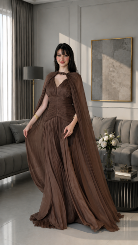 A luxurious evening dress with flowing sleeves from Rivan