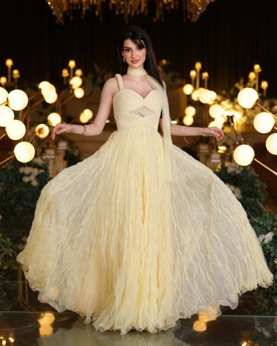 Elegant evening dress design by Rivan