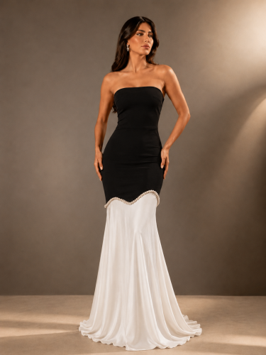 A luxurious black and white evening dress from Riv...