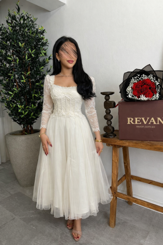 فستان عيد بتفاصيل دانتيل وتول فاخر من ريڤــان