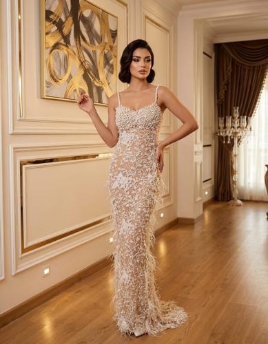 Pearl-embroidered evening dress by Rivan