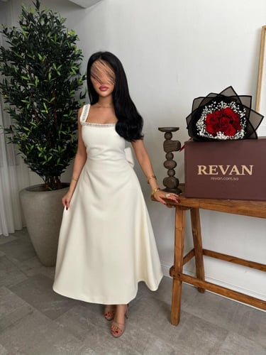 فستان عيد ميدي بفيونكة خلفية من ريڤــان