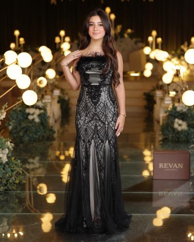 A luxurious sequined evening dress from Rivan