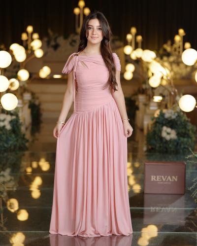 A long evening dress with feminine draping from Rivan