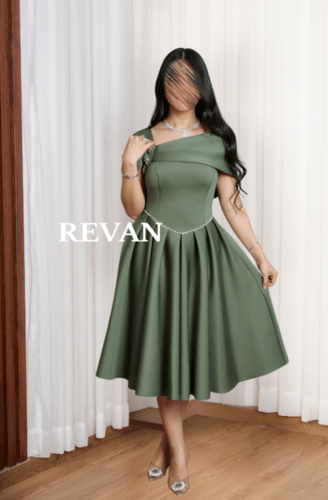 فستان بكسرات أنيقة وتصميم ملوكي