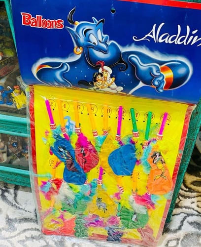 من تعليقات البقالة قديماً بداخلها بالونات كانت تبا...