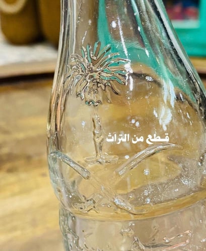 من أندر النوادر؛ غرشة بشعار الدولة سيفين ونخلة بشك...