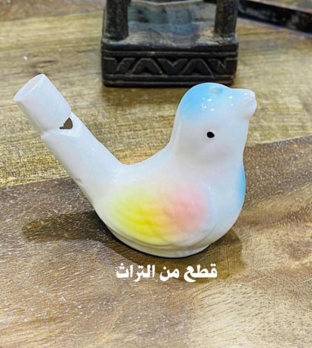 من التحف والألعاب الجميلة؛ طيور مصنوعة من السيرامي...