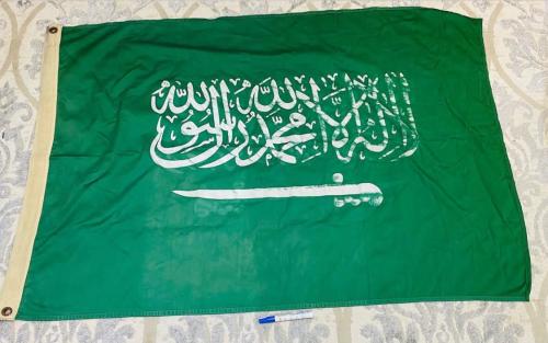 علم للمملكة العربية السعودية مستخرج من إحدى المدار...