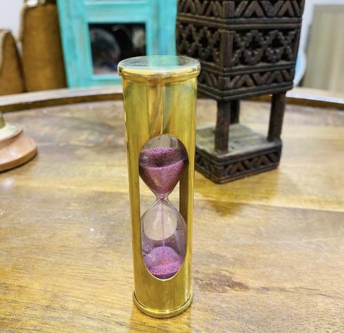 Among the rare items; a sand timer inside a very e...