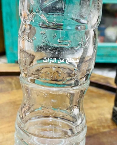 من أندر النوادر؛ غرشة بشعار الدولة سيفين ونخلة بشك...
