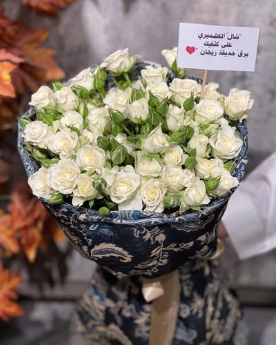 باقة ورد بيبي أبيض يتغليف فخم
