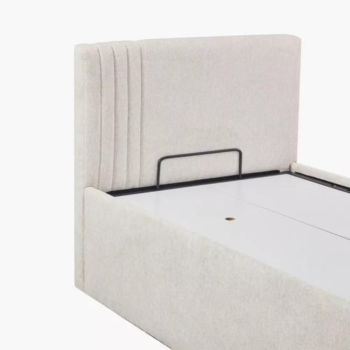 سرير فردي منجد قماش بيج بهيكل خشب هندسي بمساحة تخز...