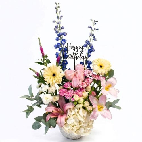A luxurious natural flower bouquet with lilies, wh...