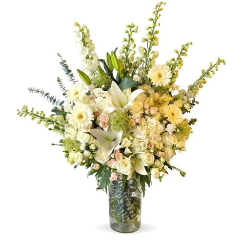 فازة ورد طبيعي فاخرة بتنسيق احترافي متعدد الأصناف