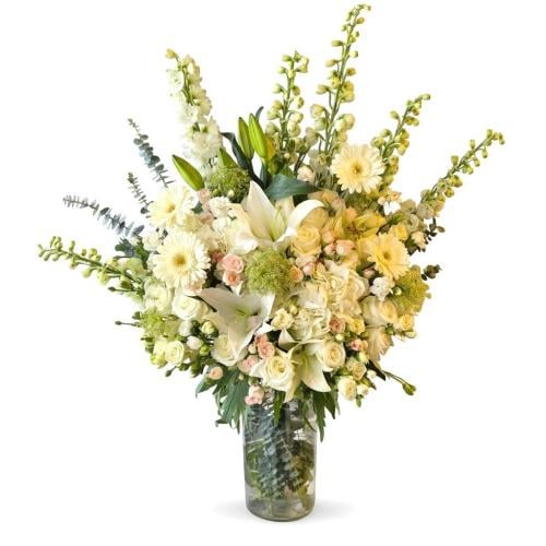 فازة ورد طبيعي فاخرة بتنسيق احترافي متعدد الأصناف