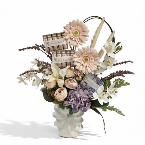 فازة ورد صناعي فاخرة بتنسيق راقٍ من الهيدرنجا والج...