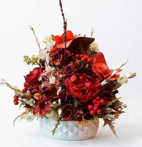 Artificial flower vase with hospitality arrangemen...