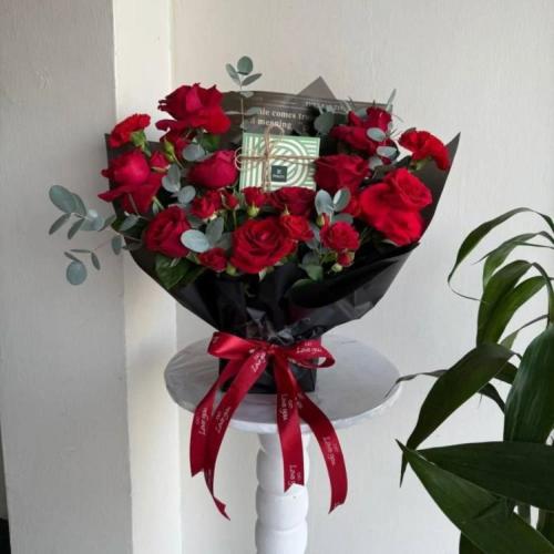 Patchi chocolate and a bouquet of flowers | Gifts...