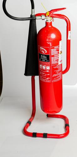Carbon extinguisher 6kg with red iron holder