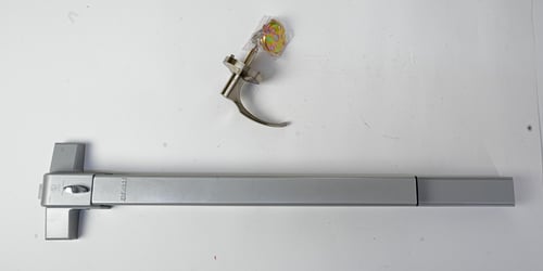 Complete emergency door latch with handle