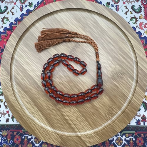 سبحة فاتوران أحمر كهرماني – 33 خرزة – كركوشة بنية