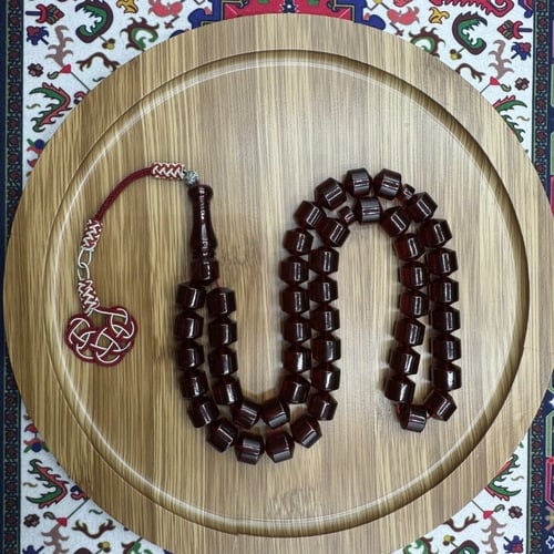 سبحة زعفران حمراء شفافة – 48 خرزة مع طرابزونة نحاس...