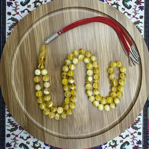 سبحة كهرمان طبيعي منوصف (قشطة بالعسل) – 73 خرزة