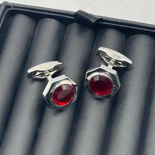Men's cufflink in silver with a hexagonal geometric design and a prominent red gemstone (inspired by Cartier)