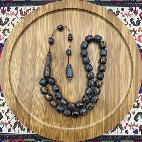 سبحة خشب كافور (خشب التزلج) لون بني داكن مع عروق ط...