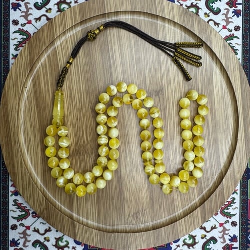 سبحة كهرمان كلنغرادي منوصف مع تلطيخ بعسل – 75 خرزة