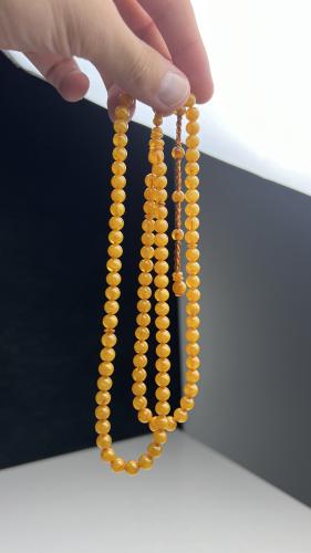 Orange فاتوران rosary with patterned