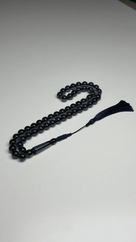 سبحة بكلايت كحلي شفاف مع كركوشة