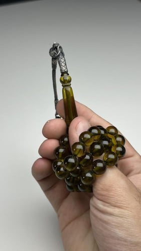 سبحة بكلايت أصفر شفاف