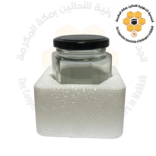 Six-sided glass bottles with cork, quarter kilogra...