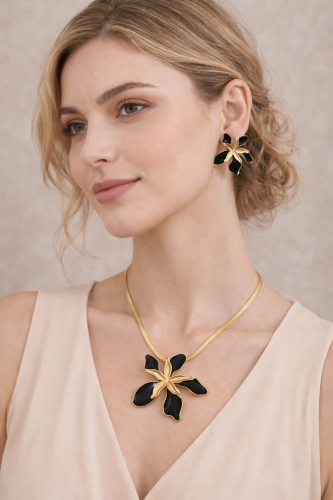 A luxurious set featuring a large black flower des...