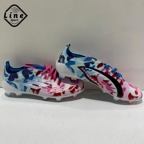 حذاء كرة قدم بتصميم "Camo" المُلفت