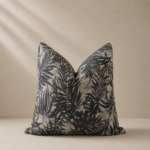 Black and beige leaf-patterned cushion cover