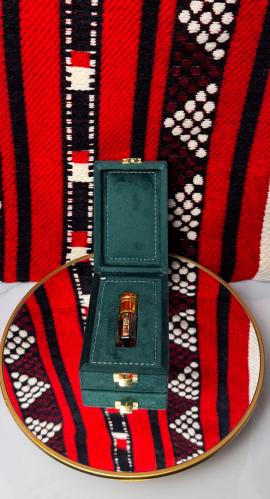 ربع تولة فارغة + علبة جلد لون اخضر مخمل