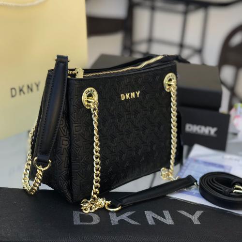 حقيبة DKNY الجلد الأنيقة: لمسة من الفخامة في كل من...