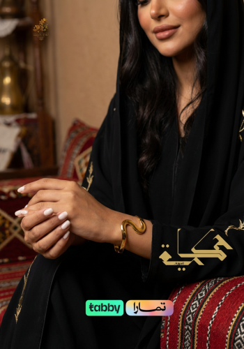 An open bracelet in an irregular spiral shape.