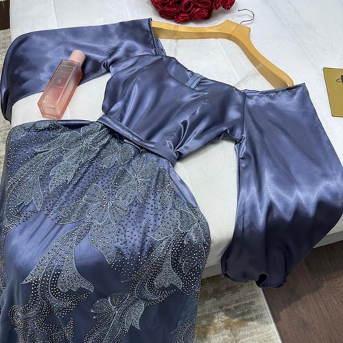 فستان سهرة ب كم طويل