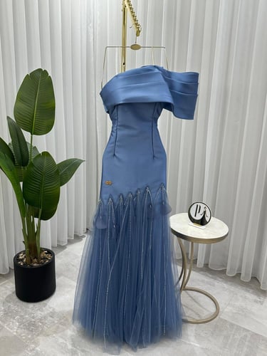 فستان ميكادو تل قص ليزر