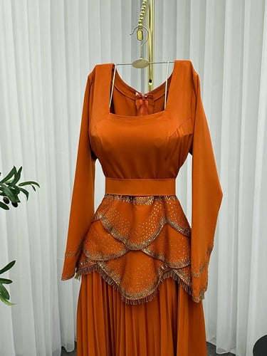 فستان اورنجي فخم فصوص راقي