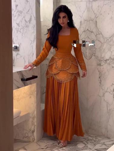 فستان اورنجي فخم فصوص راقي