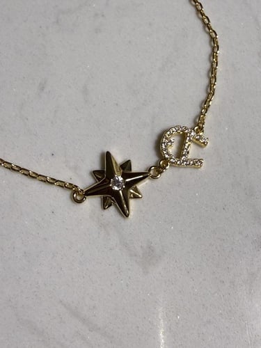 إسوارة AIGNER ذهبي