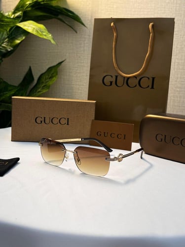 نظارة gucci - إطار ذهبي - عدسة بني مدرج