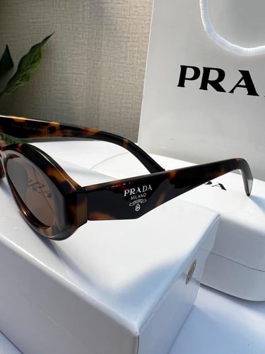 نظارة prada- إطار تايقر - عدسه بني