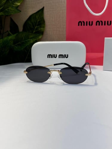 نظارة miu miu أطار ذهبي عدسة أسود