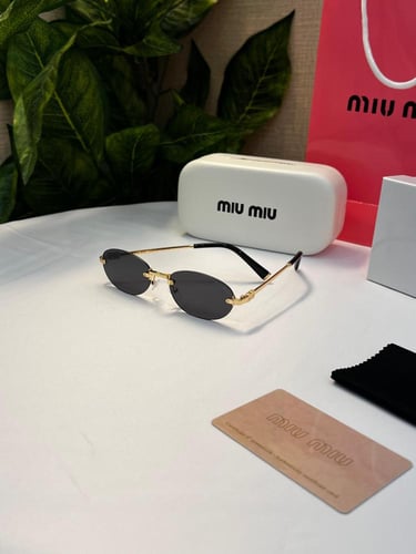 نظارة miu miu أطار ذهبي عدسة أسود